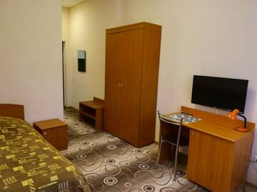 Одноместный  номер с односпальной кроватью  в Гостинице Круиз